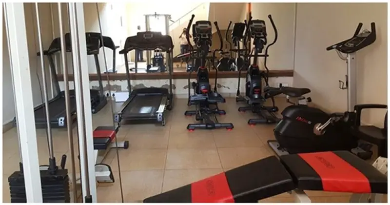 home gym equipment in a spare room